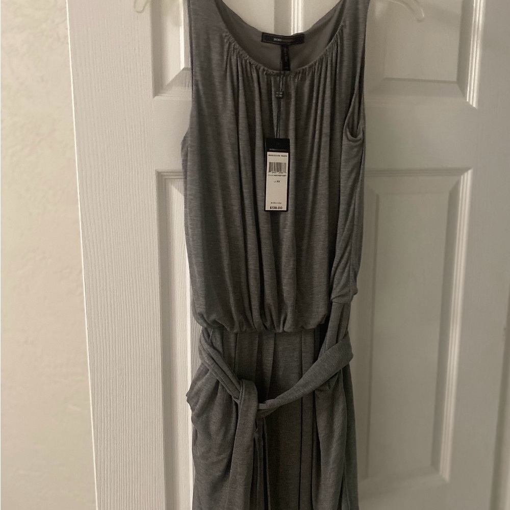 Heather Grey sleeveless dress with pockets, tie at back.